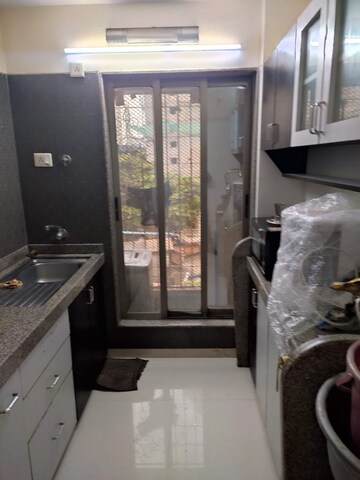 Living Room in 2 BHK Apartment at Shree Niketan, Kandivali West – for Sale
