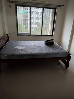Bedroom in 2 BHK Apartment at Shree Niketan, Kandivali West – for Sale