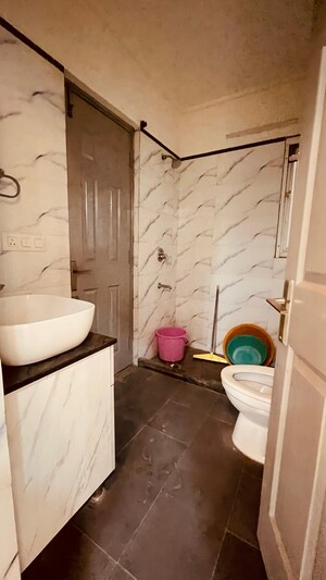 Bathroom in 2 BHK Apartment at Elite Golf Green, Sector 79 – for Rent