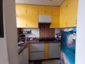 Kitchen in 2 BHK Apartment at Amrapali Zodiac, Sector 120 – for Sale