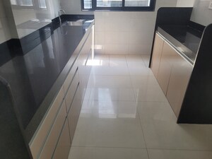 Kitchen in 2 BHK Apartment at Rachana Sankalp, Law College Road – for Rent