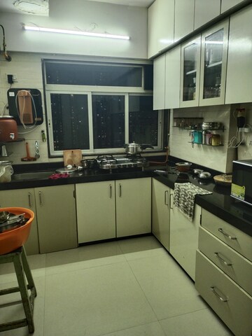 Kitchen in 3 BHK Apartment at Pinnacle CHS, Mulund West – for Rent