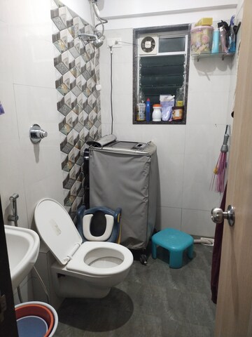 Bathroom in 3 BHK Apartment at Pinnacle CHS, Mulund West – for Rent