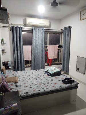 Bedroom in 3 BHK Apartment at Pinnacle CHS, Mulund West – for Rent