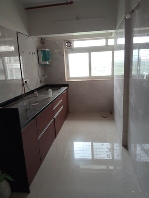Kitchen in 1 BHK Apartment at Kashish Park Centriod, Ghatkopar East – for Rent