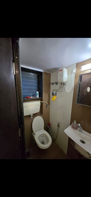 Bathroom in 1.5 BHK Apartment at Hind Mansion Apartments, Mahim West – for Rent
