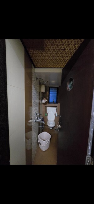 Bathroom in 1.5 BHK Apartment at Hind Mansion Apartments, Mahim West – for Rent