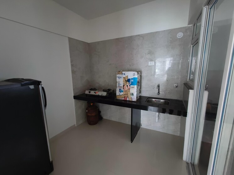 Kitchen, rama-livmo 2 Bedroom 910 Sq.Ft. Apartment In Hinjewadi Pune 9234080