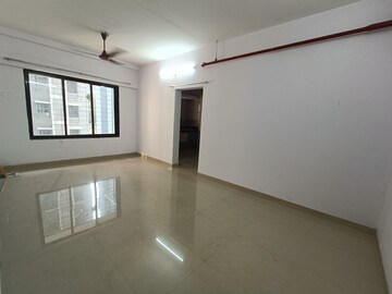 Living Room in 1 BHK Apartment at Mhada Apartments, Goregaon East – for Rent