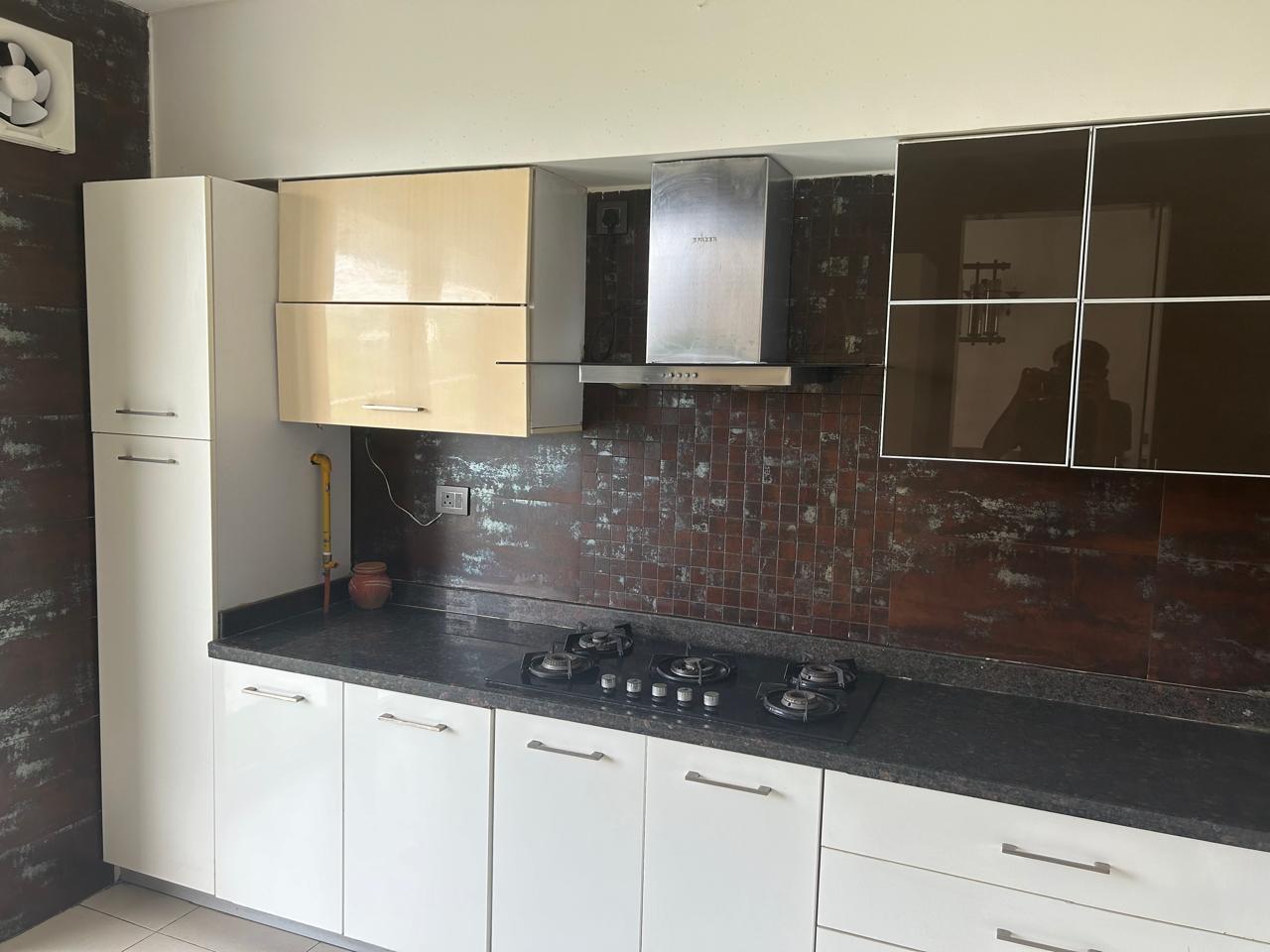 Kitchen in 4 BHK Apartment at Central Park I, Sector 42 – for Sale