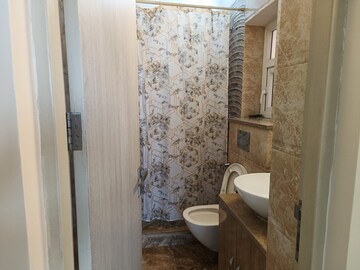 Bathroom in 3 BHK Apartment at Raheja Atlantis, Sector 31 – for Sale