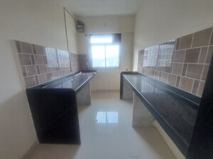 Kitchen in 2 BHK Apartment at Shivshankar Shivram Palladium, Bhandup West – for Sale