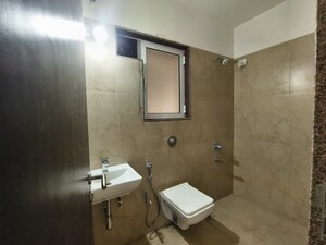 Bathroom in 2 BHK Apartment at Puranik Rumah Bali, Ghodbunder Road – for Rent
