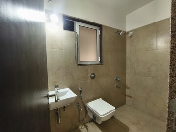 Bathroom in 2 BHK Apartment at Puranik Rumah Bali, Ghodbunder Road – for Rent