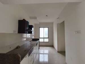 Kitchen in 2 BHK Apartment at Puranik Rumah Bali, Ghodbunder Road – for Rent