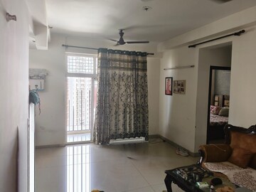 Living Room in 2 BHK Apartment at Nimbus The Hyde park, Sector 78 – for Rent