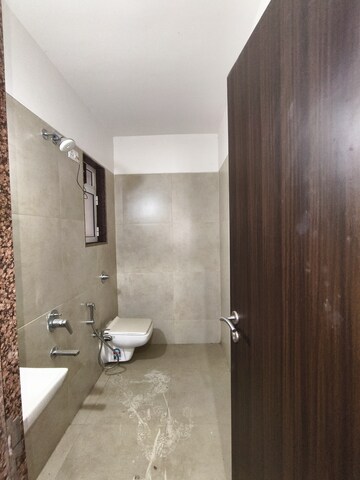 Bathroom in 1 BHK Apartment at Puranik Rumah Bali, Ghodbunder Road – for Rent