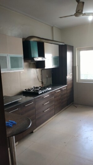 Kitchen in 3 BHK Apartment at Amrapali Platinum, Sector 119 – for Sale