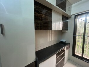 Kitchen in 1 BHK Apartment at DB Parkwoods, Kasarvadavali – for Sale