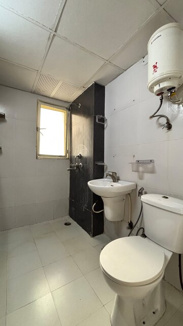 Bathroom in 3 BHK Apartment at Nimbus The Hyde park, Sector 78 – for Rent
