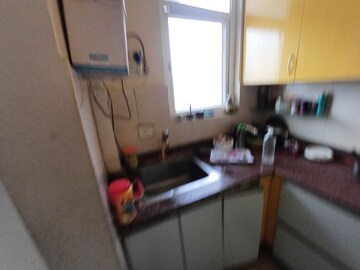 Kitchen in 3 BHK Apartment at Amrapali Zodiac, Sector 120 – for Sale