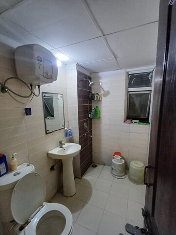 Bathroom in 3 BHK Apartment at Amrapali Zodiac, Sector 120 – for Sale