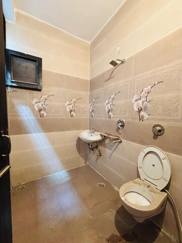 Bathroom in 2 BHK Apartment at Dhakoli – for Rent
