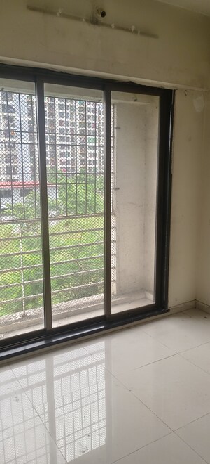 Building Lobby in 1 BHK Apartment at Ritu Gardenia, Naigaon East – for Sale