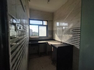 Kitchen in 1 BHK Apartment at JVM Aroma, Kasarvadavali – for Sale