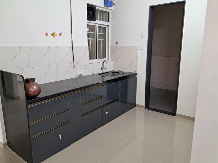 Kitchen, kolte-patil-life-republic-16th-avenue-arezo 2 Bedroom 637 Sq.Ft. Apartment In Hinjewadi Pune 9234701