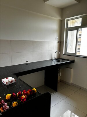 Kitchen in 1 BHK Apartment at Godrej Nirvaan, Themghar – for Rent