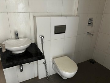 Bathroom in 1 BHK Apartment at Godrej Nirvaan, Themghar – for Rent