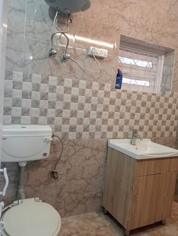 Bathroom in 1.5 BHK Apartment at Arun Vihar Sector 37, Sector 37 – for Rent