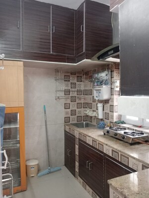 Kitchen in 1.5 BHK Apartment at Arun Vihar Sector 37, Sector 37 – for Rent
