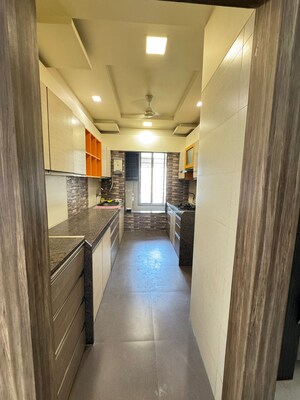 Kitchen in 2 BHK Apartment at Oberoi Realty Woods, Goregaon East – for Sale