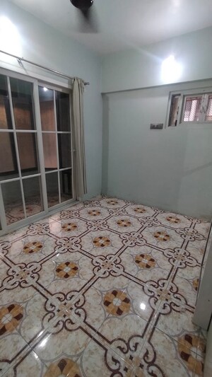 Bedroom in 1 BHK Apartment at Lok Upvan I, Manpada – for Rent