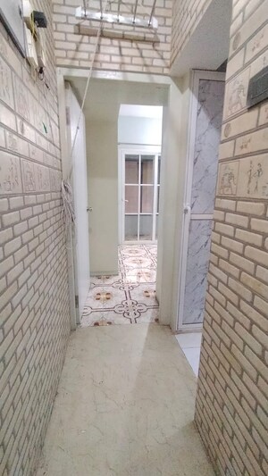 Bathroom in 1 BHK Apartment at Lok Upvan I, Manpada – for Rent