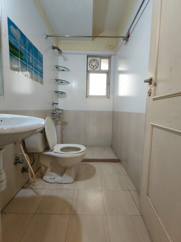 Bathroom in 2 BHK Apartment at Puranik Aarambh, Ghodbunder Road – for Rent