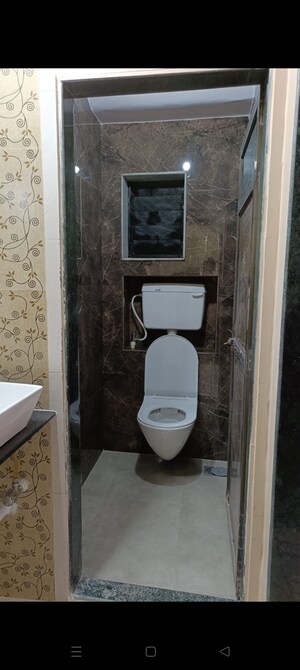 Bathroom in 1 BHK Apartment at Shiv Tower, Khopat – for Rent