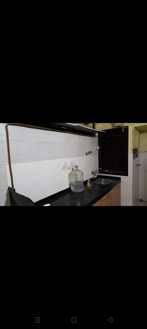 Kitchen in 1 BHK Apartment at Shiv Tower, Khopat – for Rent