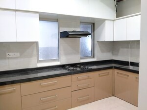 Kitchen in 3 BHK Apartment at Oberoi Realty Esquire, Goregaon East – for Rent