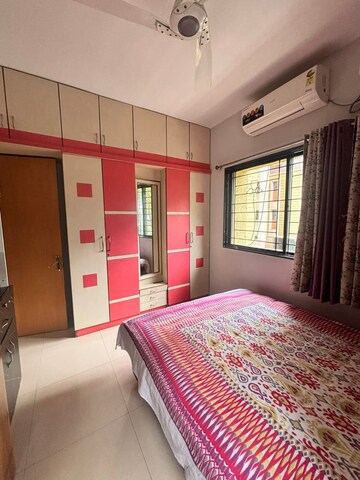 Bedroom in 2 BHK Apartment at Magarpatta Trillium, Hadapsar – for Rent