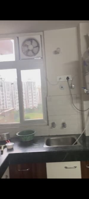 Kitchen in 2 BHK Apartment at Shree Vardhman Green Court, Sector 90 – for Sale