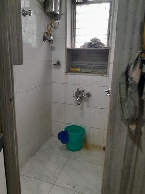 Bathroom in 1.5 BHK Apartment at Ram Niketan CHS, Andheri East – for Rent