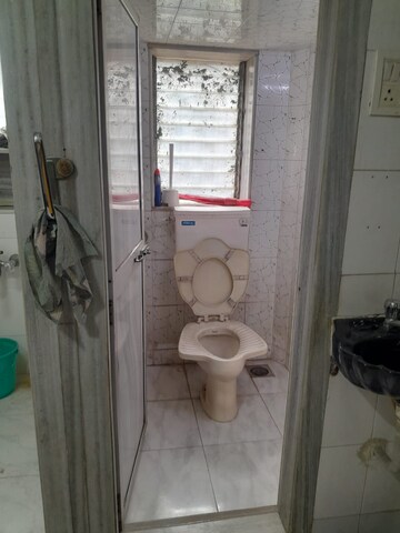 Bathroom in 1.5 BHK Apartment at Ram Niketan CHS, Andheri East – for Rent