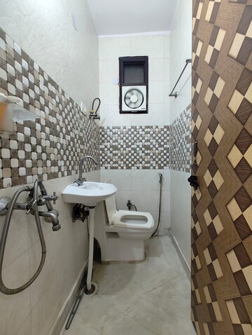 Bathroom in 2.5 BHK Builder Floor at Govindpuri – for Rent