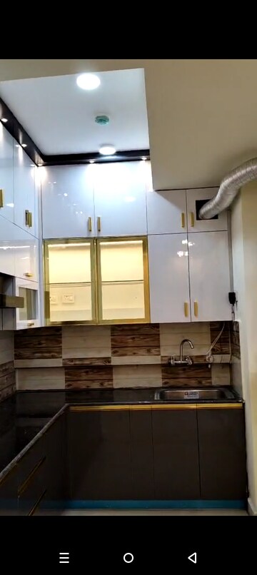 Kitchen in 2 BHK Apartment at Amrapali Enchante, Tech Zone 4 Greater Noida – for Rent