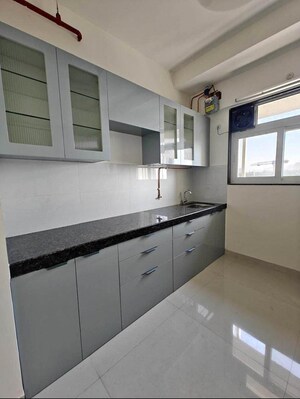 Kitchen in 2 BHK Apartment at Amogh Chandrakant Residency, Dombivli East – for Sale
