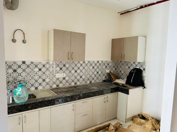 Kitchen in 3 BHK Apartment at Dev Sai Sports Home, Sector 1 Greater Noida – for Rent