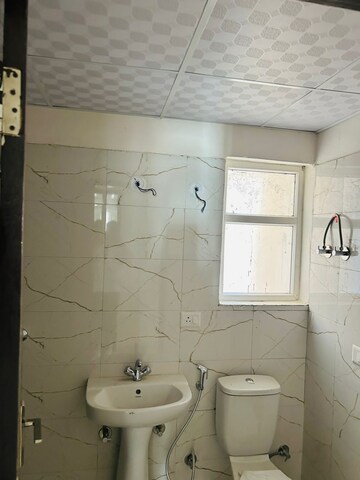 Bathroom in 3 BHK Apartment at Dev Sai Sports Home, Sector 1 Greater Noida – for Rent